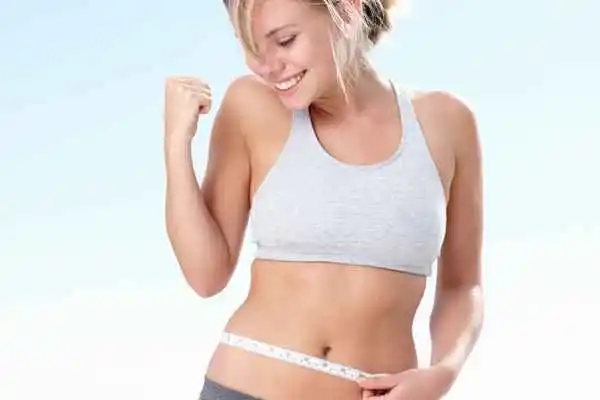 woman happy after fat reduction treatment Ramsey
